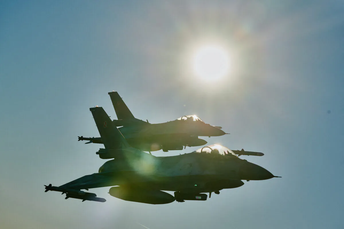 F-16 fighter jets takes part in the NATO Air Shielding exercise near the air base in Lask, Poland, on Oct. 12, 2022. (Radoslaw Jozwiak/AFP via Getty Images)