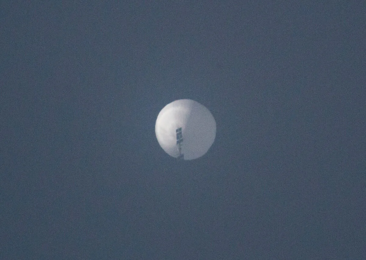 A balloon flies in the sky over Billings, Mont., on Feb. 1, 2023. (Chase Doak via Reuters)