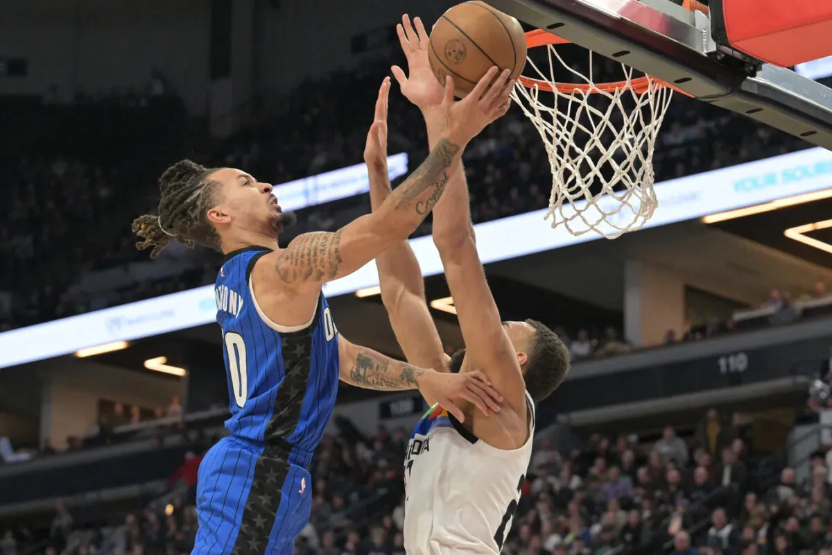 Orlando Magic guard Cole Anthony (50) goes to the basket as Minnesota Timberwolves center Rudy Gobert (27) defends during the second quarter at Target Center in Minneapolis, Minn., on Feb 3, 2023. (Jeffrey Becker/USA TODAY Sports via Field Level Media)