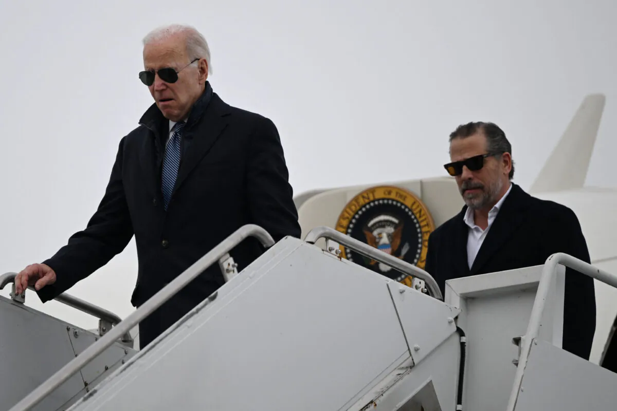 President Joe Biden, with son Hunter Biden, arrives at Hancock Field Air National Guard Base in Syracuse, New York, on Feb. 4, 2023. (Andrew Caballero-Reynolds/AFP via Getty Images)