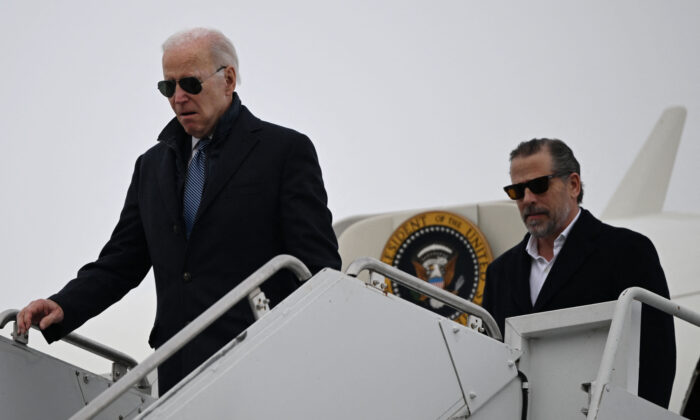 President Joe Biden, with son Hunter Biden, arrives at Hancock Field Air National Guard Base in Syracuse, New York, on Feb.  4, 2023. (Andrew Caballero-Reynolds/AFP via Getty Images)
