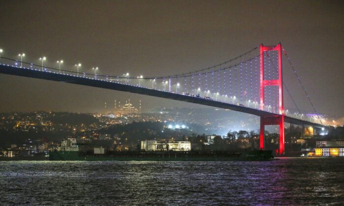 The VF Tanker 9 oil tanker ship sailing under the 15th of July Martyrs Bridge in the Bosphorus, Istanbul, Turkey, December 15th, 2022, left the port of Temryuk, Russia on December 12th.  (The Canadian Press/AP-Emrah Gurel)