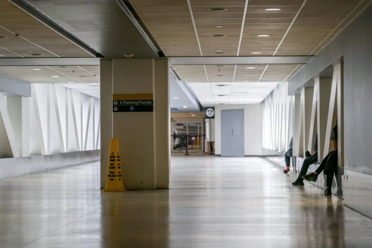 People wait in a hallway at the George Bush Intercontinental Airport in Houston in a file photo. (Brandon Bell/Getty Images)