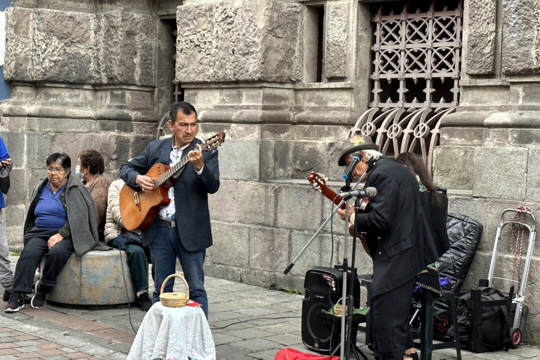 Street performers in Quito's old town. (Tim Johnson)