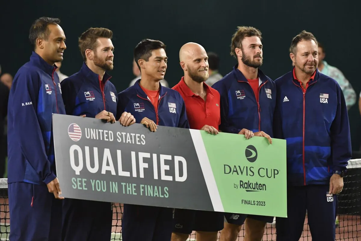 Team USA poses for a photo after playing the Davis Cup qualifier tennis match between Uzbekistan and the United States in Tashkent, Uzbekistan, on Feb. 4, 2023. (AP Photo)