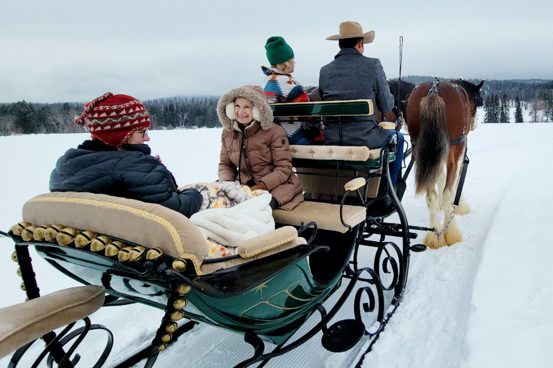 A sleigh ride is a perfect way to enjoy the winter scenery around Kalispell, Montana. (Courtesy of Jim Farber)