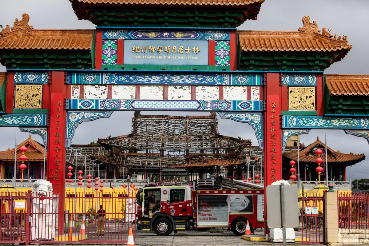 Firefighters are seen at the scene of a fire at the Bright Moon Buddhist Temple in Springvale South, Melbourne. Eighty firefighters have battled a blaze that has damaged the temple. Monday, February 6, 2023. (AAP Image/Diego Fedele)