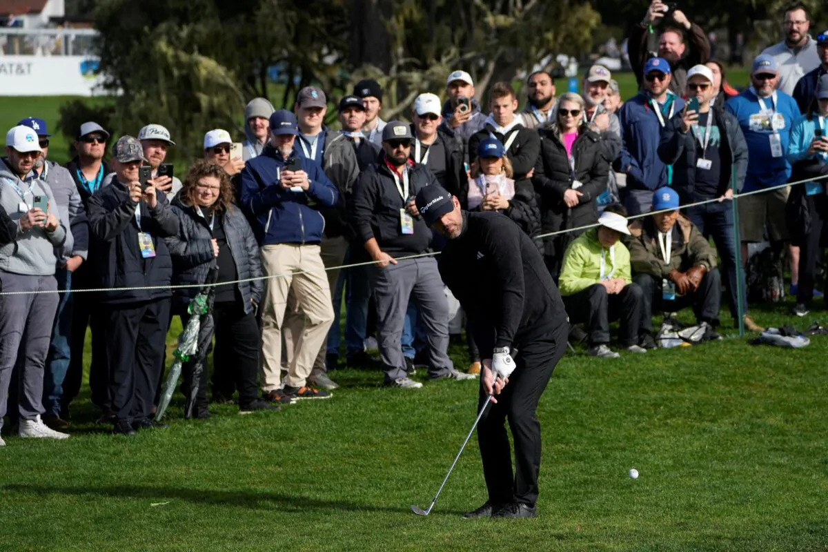 Aaron Rodgers follows his shot onto the 16th green of the Pebble Beach Golf Links during the third round of the AT&T Pebble Beach Pro-Am golf tournament in Pebble Beach, Calif., on Feb. 5, 2023. (Godofredo A. Vásquez/AP)