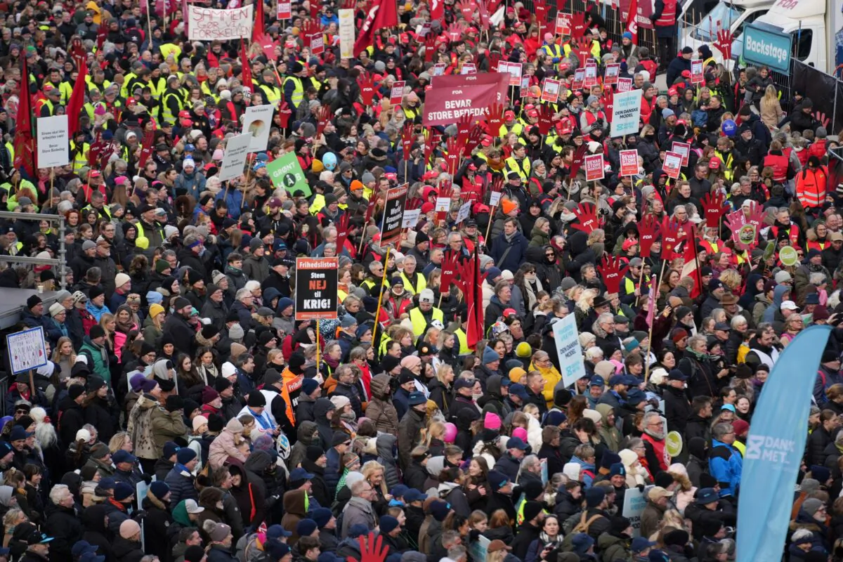 Demonstrators take part in a protest against the government's proposal to abolish a public holiday to help finance the defence budget in front of the Danish Parliament in Copenhagen, Denmark, on Feb. 5, 2023. (The Ritzau Scanpix/Emil Helms via Reuters)