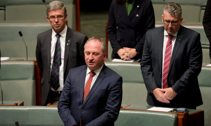 Former Australian Deputy Prime Minister Barnaby Joyce and other MPs pray at Parliament House in Canberra, Australia, on July 29, 2019. (Tracey Nearmy/Getty Images)