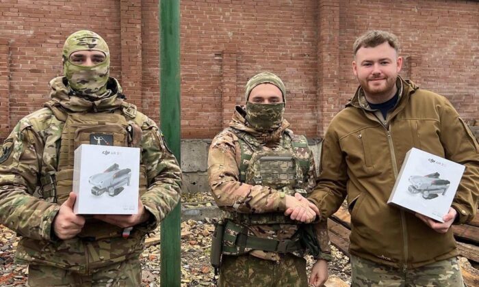 (R) Jack Ross from British aid charity Vans Without Borders delivering drones to the 1st President’s Battalion in Ukraine on Jan. 19, 2023. (Courtesy of Jack Ross)