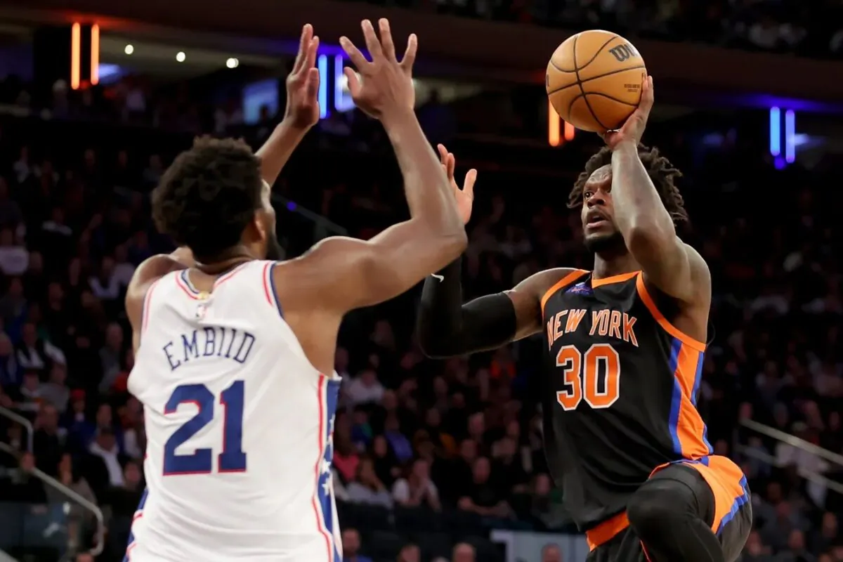 New York Knicks forward Julius Randle (30) takes a shot against Philadelphia 76ers center Joel Embiid (21) during the fourth quarter at Madison Square Garden in New York on Feb. 5, 2023. (Brad Penner/USA TODAY Sports via Field Level Media)