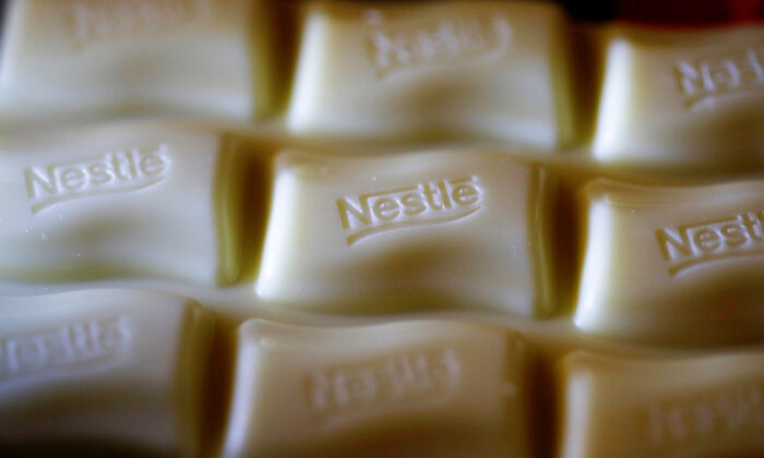 A Nestle company logo on a bar of Milky Bar chocolate in Manchester, Britain, on April 25, 2017. (Phil Noble/Reuters)
