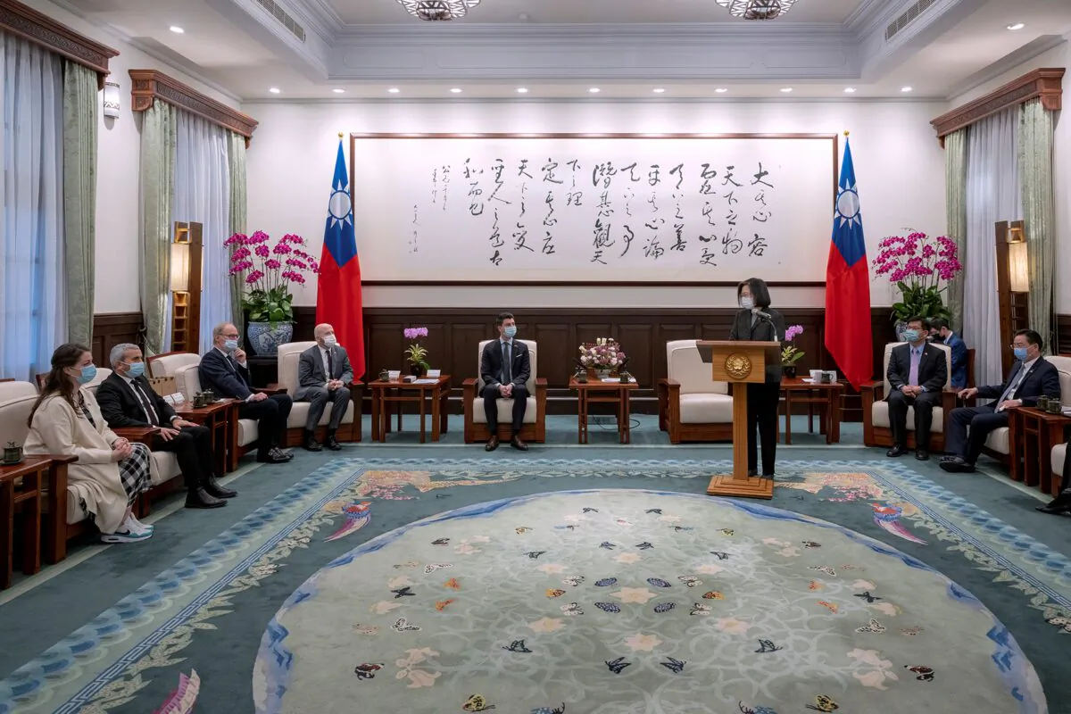 Taiwan's President Tsai Ing-wen (center R) speaks during a meeting with Swiss lawmakers in Taipei, Taiwan, on Feb. 6, 2023. (Taiwan Presidential Office via AP)