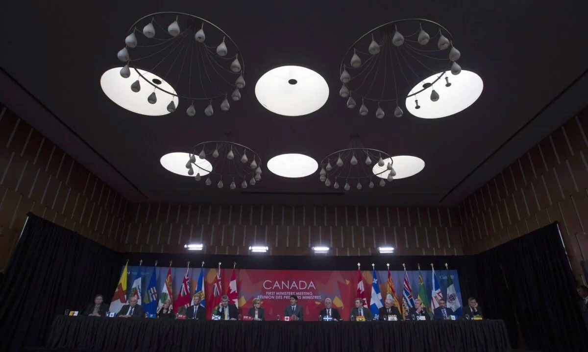 Canadian premiers listen to Prime Minister Justin Trudeau during the closing news conference at the First Ministers Meeting in Ottawa, Oct. 3, 2017. (The Canadian Press/Adrian Wyld)
