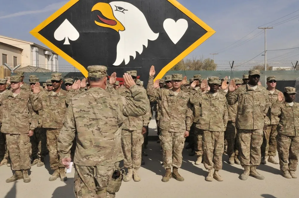 "Commitment: Taking the Oath." (Sgt. Sinthia Rosario/Defense Department)