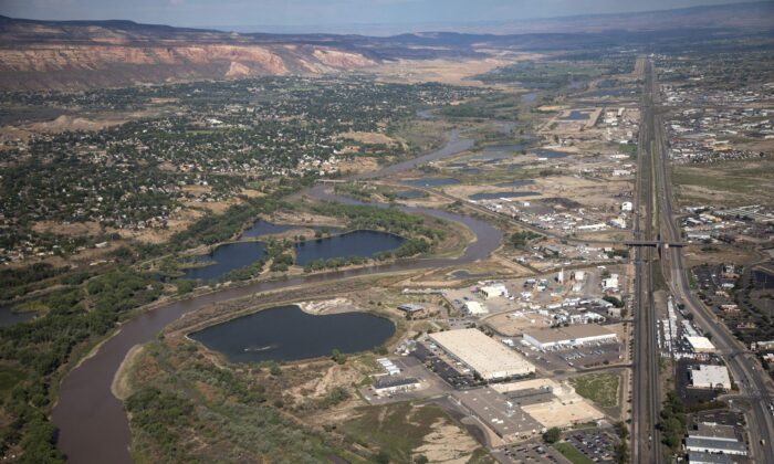 The Colorado River passes through Grand Junction in Mesa County, Colo., on Aug. 24, 2022. (Hugh Carey/The Colorado Sun via AP)