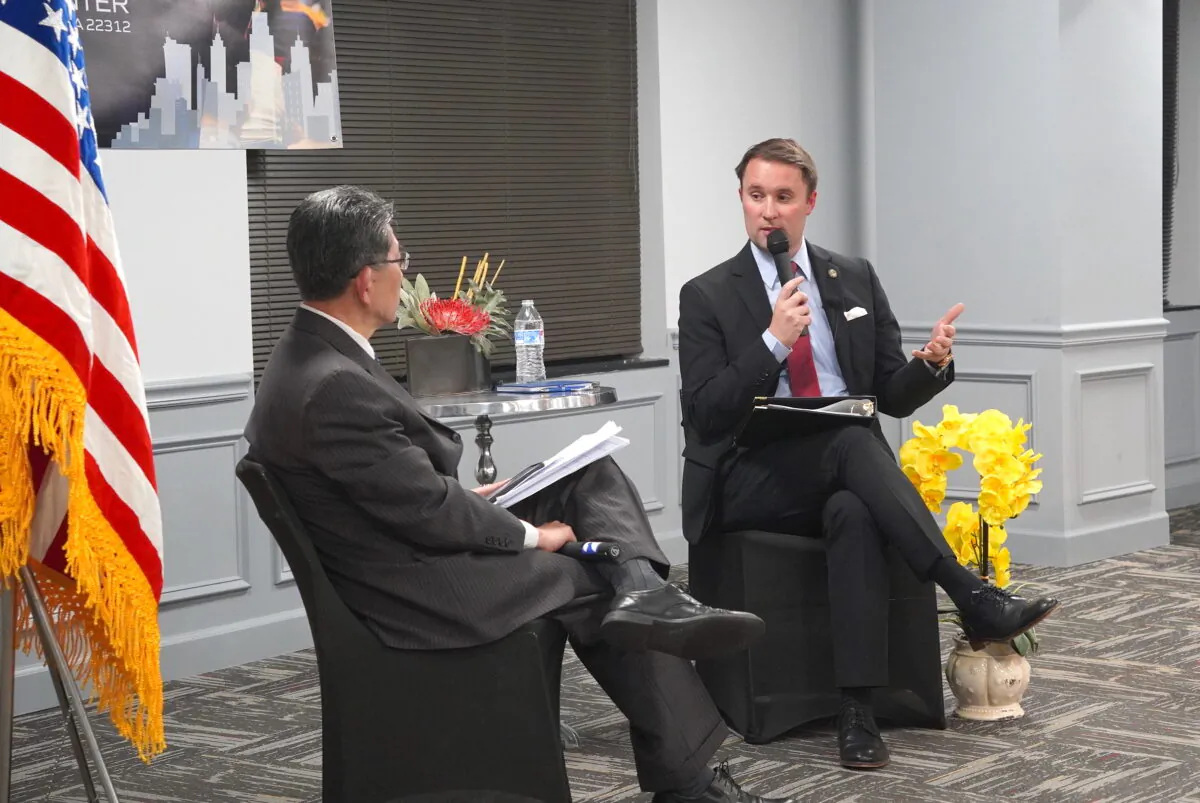 Virginia Attorney General Jason Miyares (R) with Harold Pyon, deputy commissioner of Virginia's Department of Labor and Industry, at an Asian American town hall in Alexandria, Va., on Feb. 6, 2023. (Terri Wu/The Epoch Times)