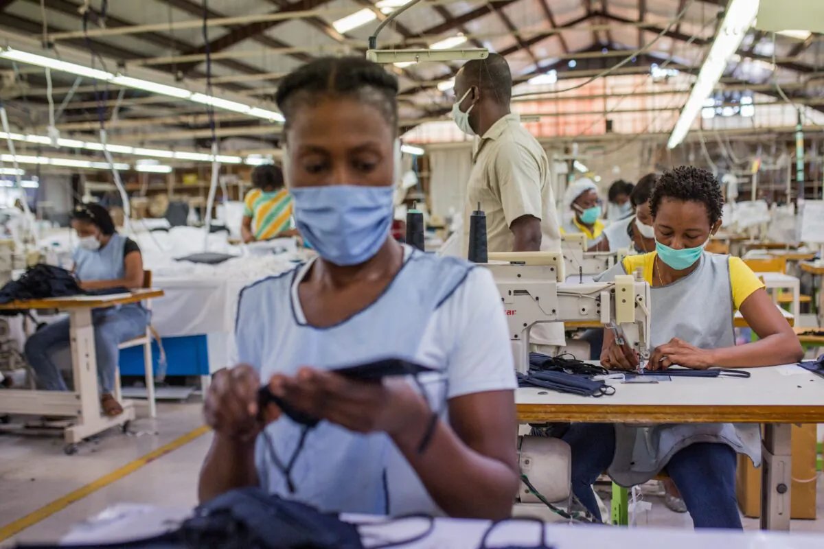 People work at a factory in Port-au-Prince, Haiti, in a file photo. (Pierre Michel Jean/AFP via Getty Images)