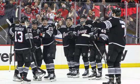 NHL Roundup: Devils Blow Lead, Top Canucks in Overtime