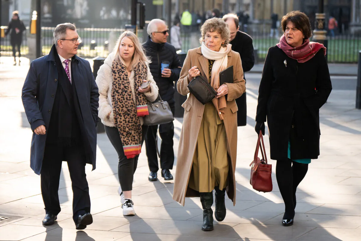 DUP leader Sir Jeffrey Donaldson (left), Ben Habib (back left), Baroness Kate Hoey (second right), and former first minister Dame Arlene Foster (right), outside the UK Supreme Court in London, where judges are delivering a ruling on the lawfulness of the Northern Ireland Protocol, on Feb. 8, 2023. (PA)