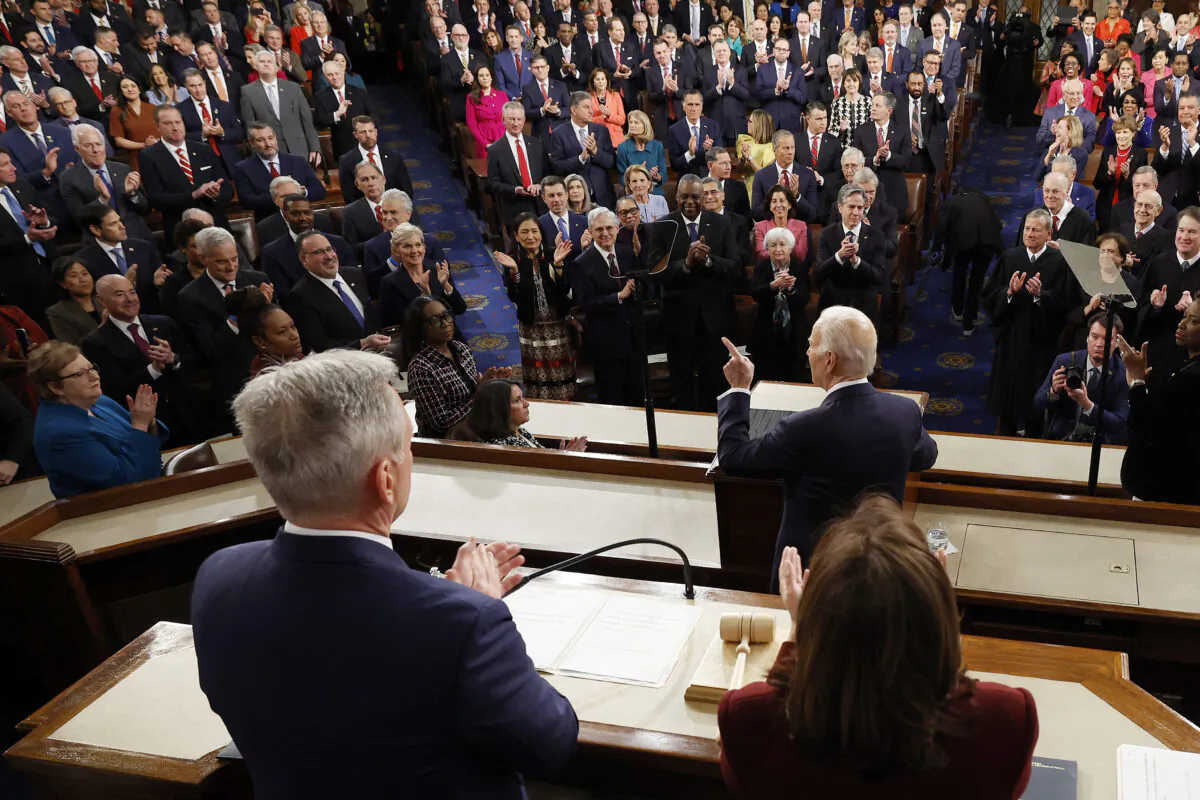 U.S. Vice President Kamala Harris (R) and U.S. Speaker of the House Kevin McCarthy (R-Calif.) listen as U.S. President Joe Biden delivers the State of the Union address in the House Chamber of the U.S. Capitol in Washington on Feb. 7, 2023. (Kevin Dietsch/AFP via Getty Images)
