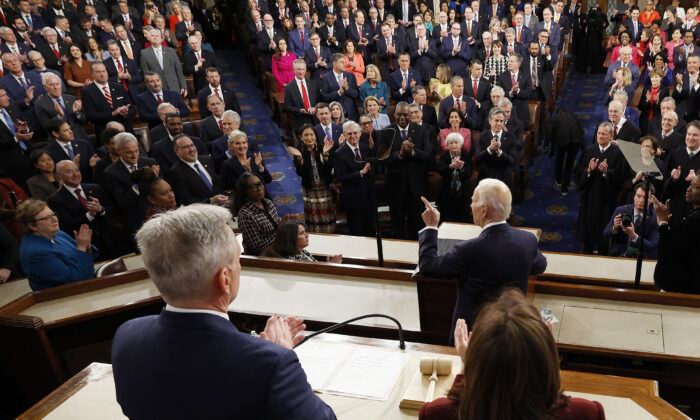 U.S. Vice President Kamala Harris (R) and U.S. Speaker of the House Kevin McCarthy (R-Calif.) listen as U.S. President Joe Biden delivers the State of the Union address in the House Chamber of the U.S. Capitol in Washington on Feb. 7, 2023. (Kevin Dietsch/AFP via Getty Images)