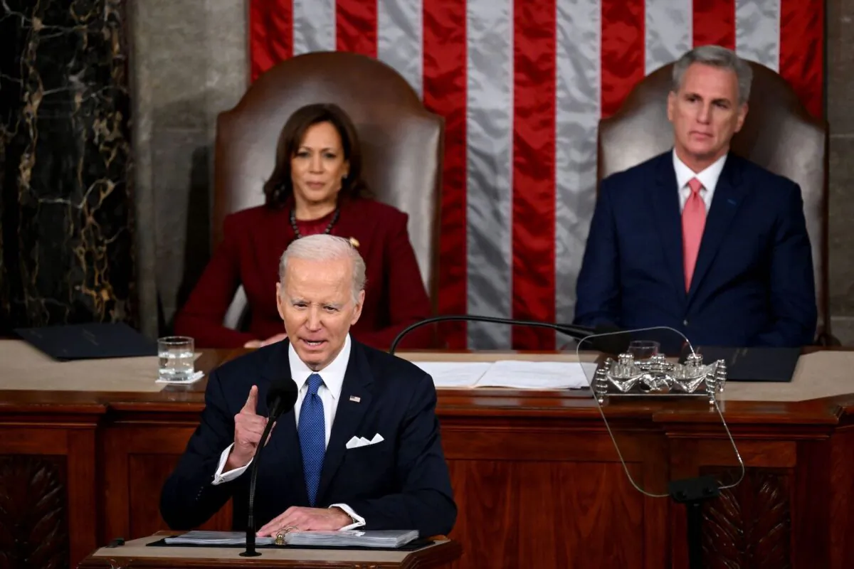 Vice President Kamala Harris and Speaker of the House Kevin McCarthy (R-Calif.) listen as President Joe Biden delivers the State of the Union address in the House Chamber of the U.S. Capitol in Washington on Feb. 7, 2023. (Saul Loeb/AFP via Getty Images)