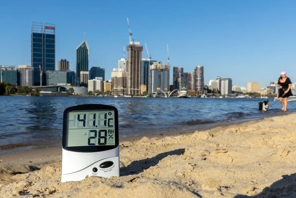 In this photo illustration a thermometer is seen on the banks of the Swan River on January 22, 2022 in Perth, Australia. (Photo by Paul Kane/Getty Images)