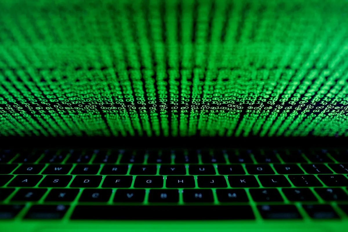 A computer keyboard lit by a displayed cyber code on March 1, 2017. (Kacper Pempel/Reuters)