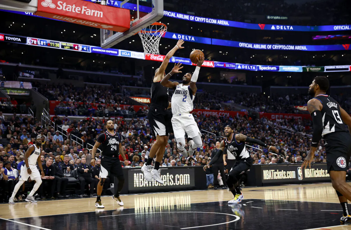 Kyrie Irving (2) of the Dallas Mavericks takes a shot against Nicolas Batum (33) of the LA Clippers in the second half in Los Angeles on Feb. 8, 2023. (Ronald Martinez/Getty Images)