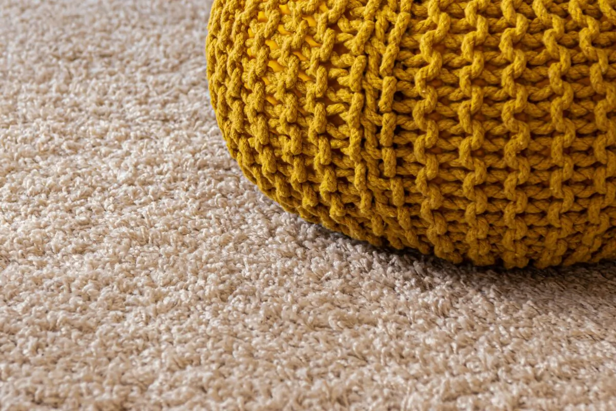 Carpet padding is designed to absorb the impact of feet on the carpet, control the flex of the carpet backing, provide comfortable walking and to provide some insulation over cold floors. (Ran Berkovich/Unsplash)