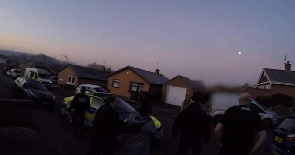 The National Crime Agency arrests a woman on suspicion of PPE fraud during raids in Loughborough, England, on Feb. 9, 2023. (National Crime Agency)