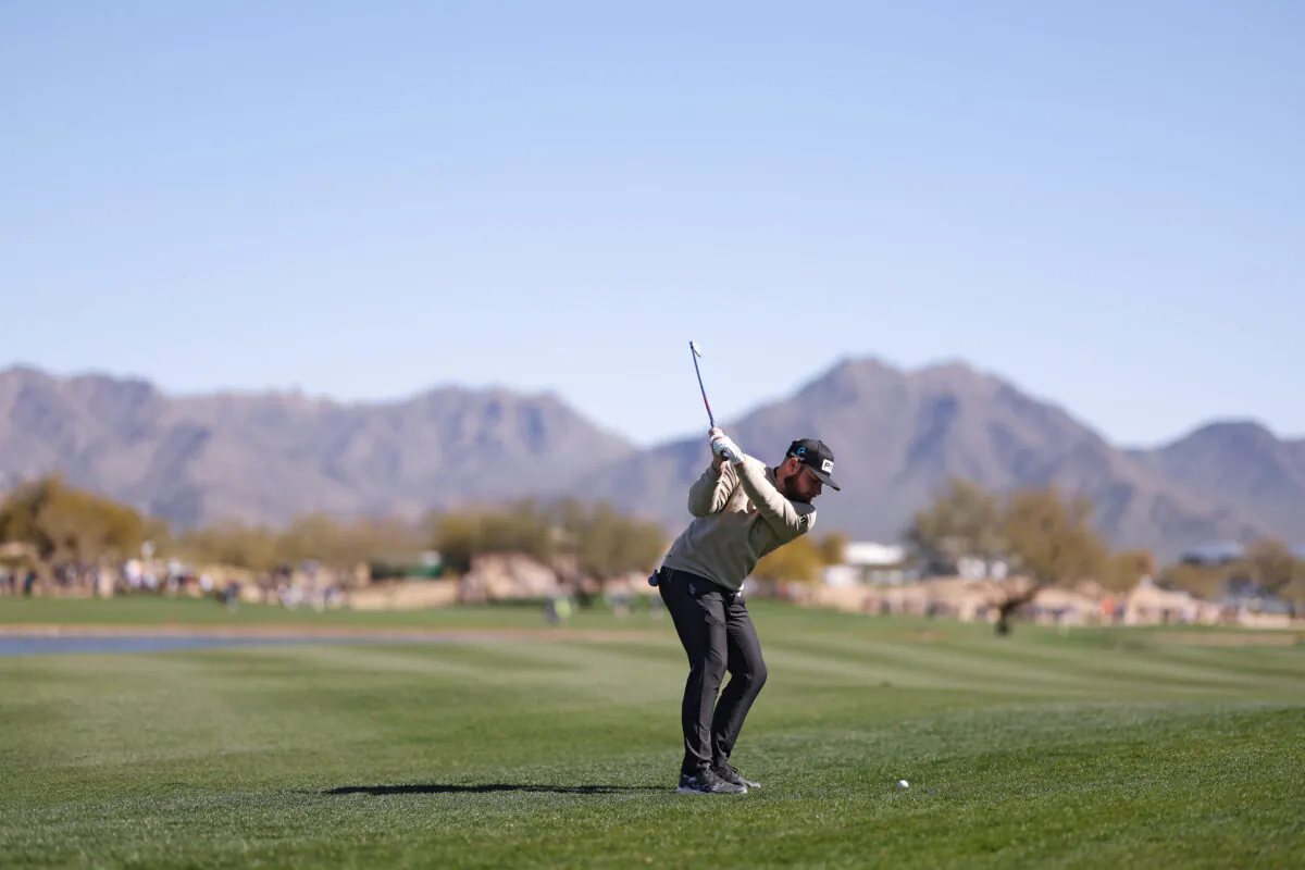 Adam Hadwin of Canada plays an approach shot on the 15th hole during the first round of the WM Phoenix Open at TPC Scottsdale in Scottsdale, Ariz., on Feb. 9, 2023. (Maddie Meyer/Getty Images)