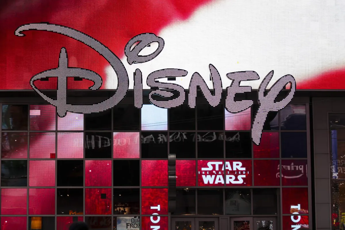 The Disney logo is displayed outside the Disney Store in Times Square in New York on Dec. 14, 2017. (Drew Angerer/Getty Images)