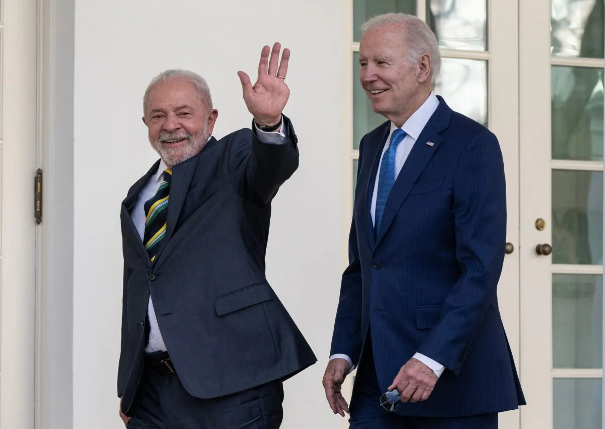 President Joe Biden and Brazilian President Luiz Inacio Lula da Silva (L) walk together along the Rose Garden colonnade at the White House on Feb. 10, 2023. (Andrew Caballero/Pool/AFP via Getty Images)