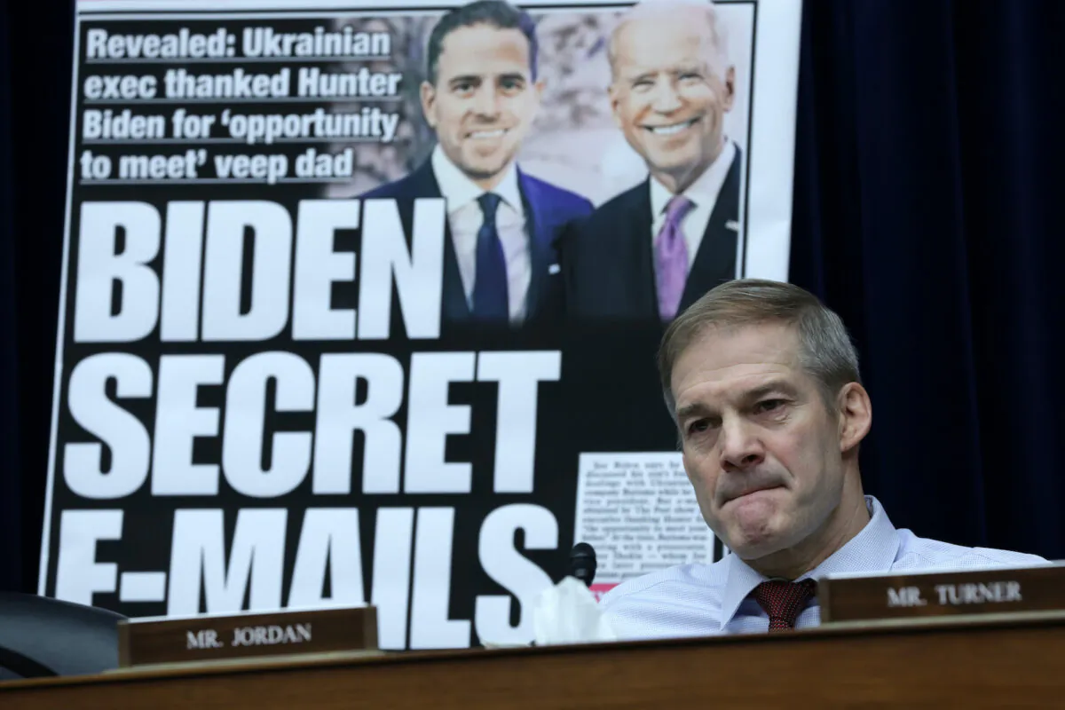 With a poster of a New York Post front page story about Hunter Biden’s emails on display, Rep. Jim Jordan (R- Ohio) listens during a hearing before the House Oversight and Accountability Committee at Rayburn House Office Building on Capitol Hill in Washington on Feb. 8, 2023. (Alex Wong/Getty Images)