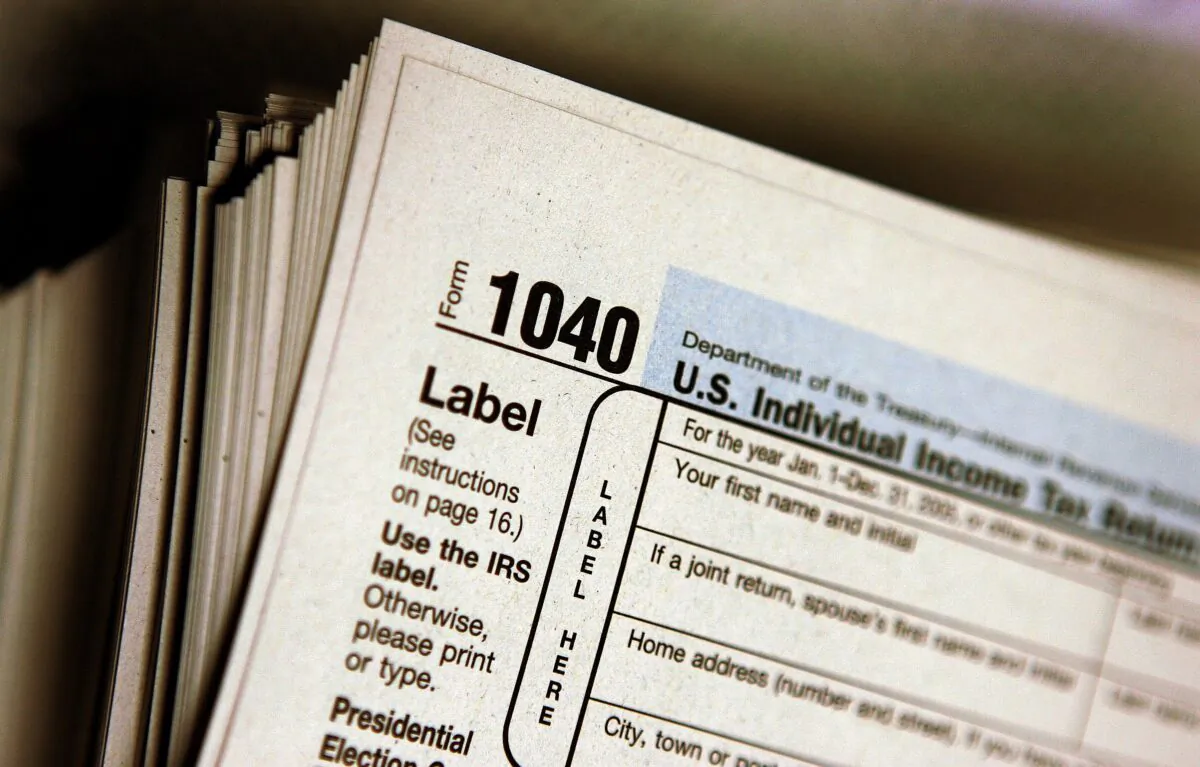 The top of a form 1040 individual income tax return is seen in a file photo. Americans are preparing for the income tax filing deadline on April 18, 2023. (Tim Boyle/Getty Images)
