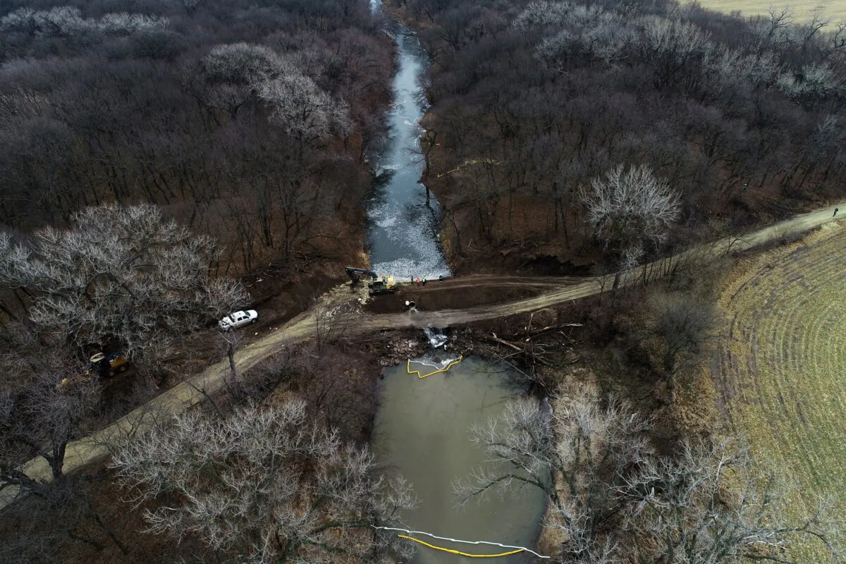 Cleanup activity in the area where the ruptured Keystone pipeline dumped oil into a creek in Washington County, Kansas, on Dec. 9, 2022. (DroneBase/AP)