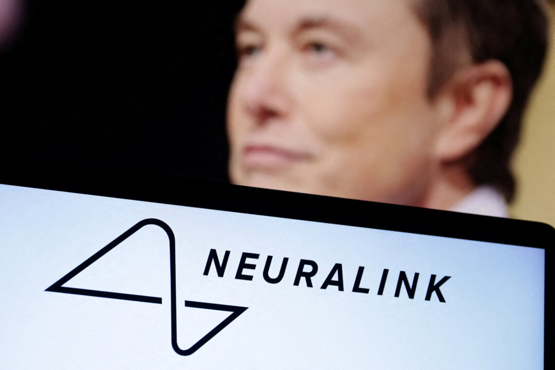 The Neuralink logo and Elon Musk are shown in an illustration from Dec. 19, 2022. (Dado Ruvic/Illustration/Reuters)