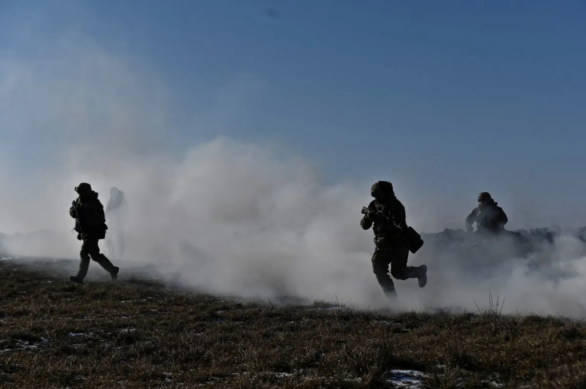 Ukrainian service members at military exercises, amid Russia's attack on Ukraine, at a training ground in Zaporizhzhia region, Ukraine, on Feb. 8, 2023. (Stringer/Reuters)