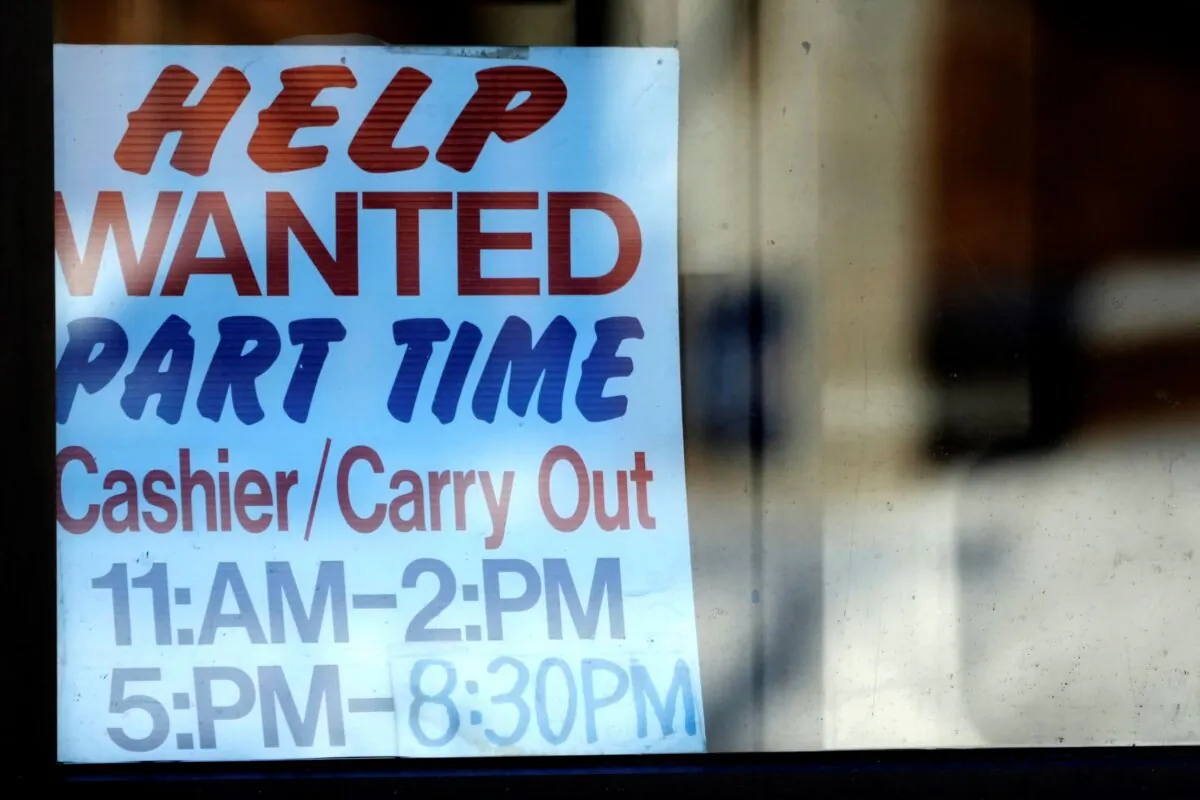 A “Help Wanted” sign is displayed at a restaurant in Arlington Heights, Ill., on Jan. 30, 2023. (Nam Y. Huh/AP Photo)