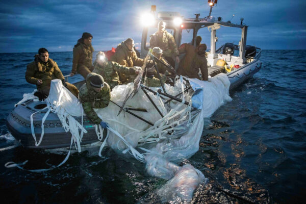 Sailors recover a high-altitude surveillance balloon off the coast of Myrtle Beach, South Carolina