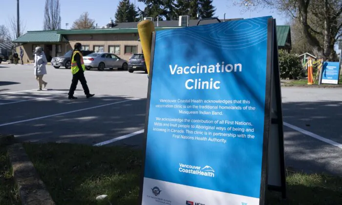 A sign for a COVID-19 vaccination clinic run by Vancouver Coastal Health in Richmond, B.C., on April 10, 2021. (The Canadian Press/Jonathan Hayward)