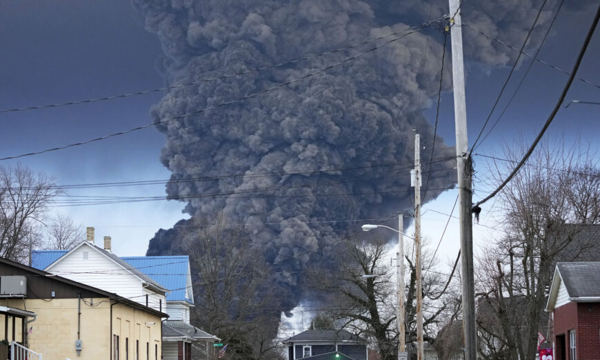 A black plume rises over East Palestine, Ohio, as a result of a controlled detonation of a portion of the derailed Norfolk Southern trains, on Feb. 6, 2023. (Gene J. Puskar/AP Photo)
