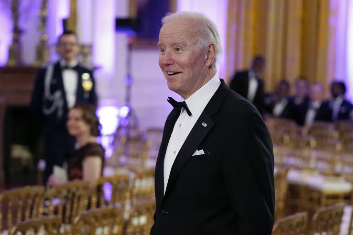 President Joe Biden arrives in the East Room of the White House following a dinner reception for the governors and their spouses, on Feb. 11, 2023. (Manuel Balce Ceneta/AP Photo)