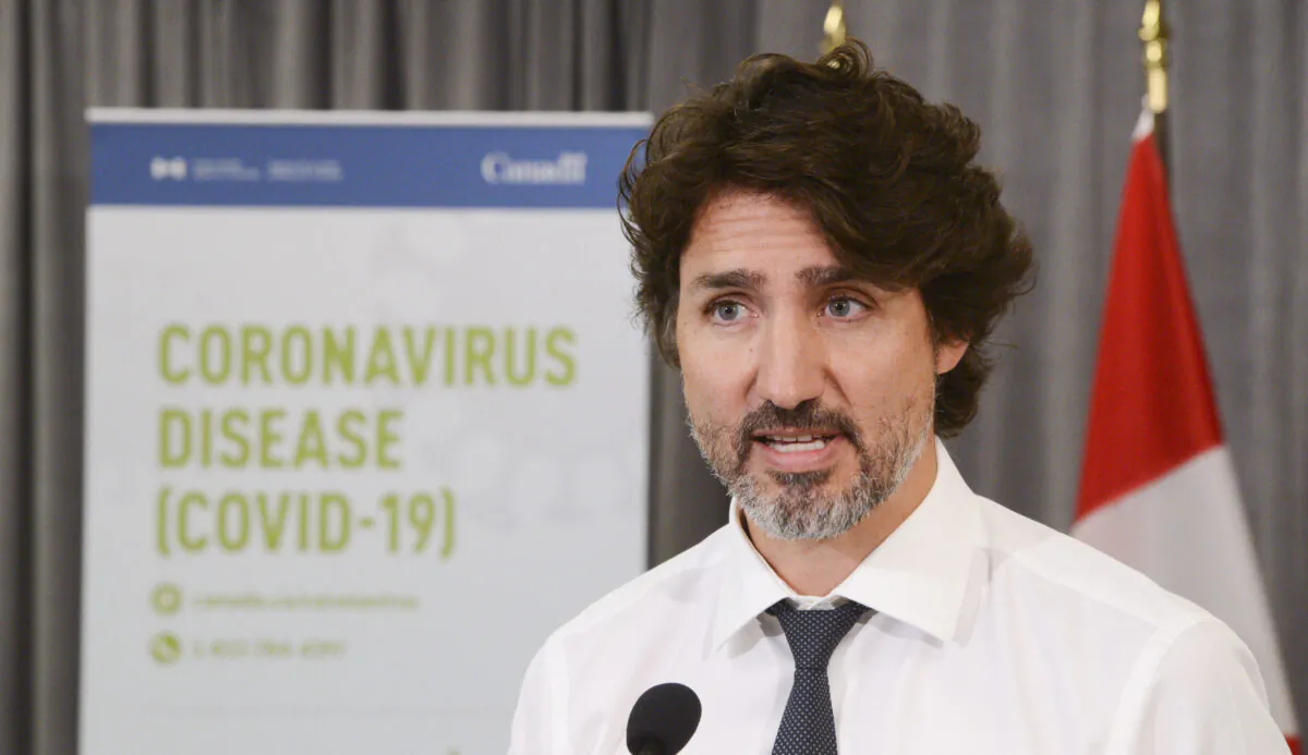 Prime Minister Justin Trudeau holds a press conference as he visits the Public Health Agency of Canada during the COVID-19 pandemic in Ottawa on July 31, 2020. (The Canadian Press/Sean Kilpatrick)