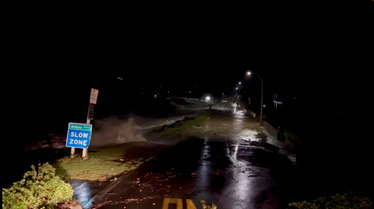 High tides are rising due to Cyclone Gabrielle in Arkles Bay, Auckland, New Zealand, on Feb. 13, 2023. (John Longson/Twitter @JohnLongson/via Reuters)