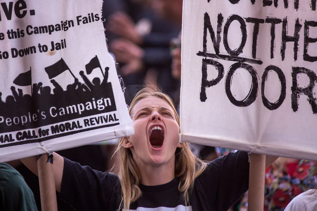 A woman attends a protest outside the Metropolitan Detention Center, after marching to decry immigration and refugee policies, in Los Angeles on June 30, 2018. (David McNew/Getty Images)