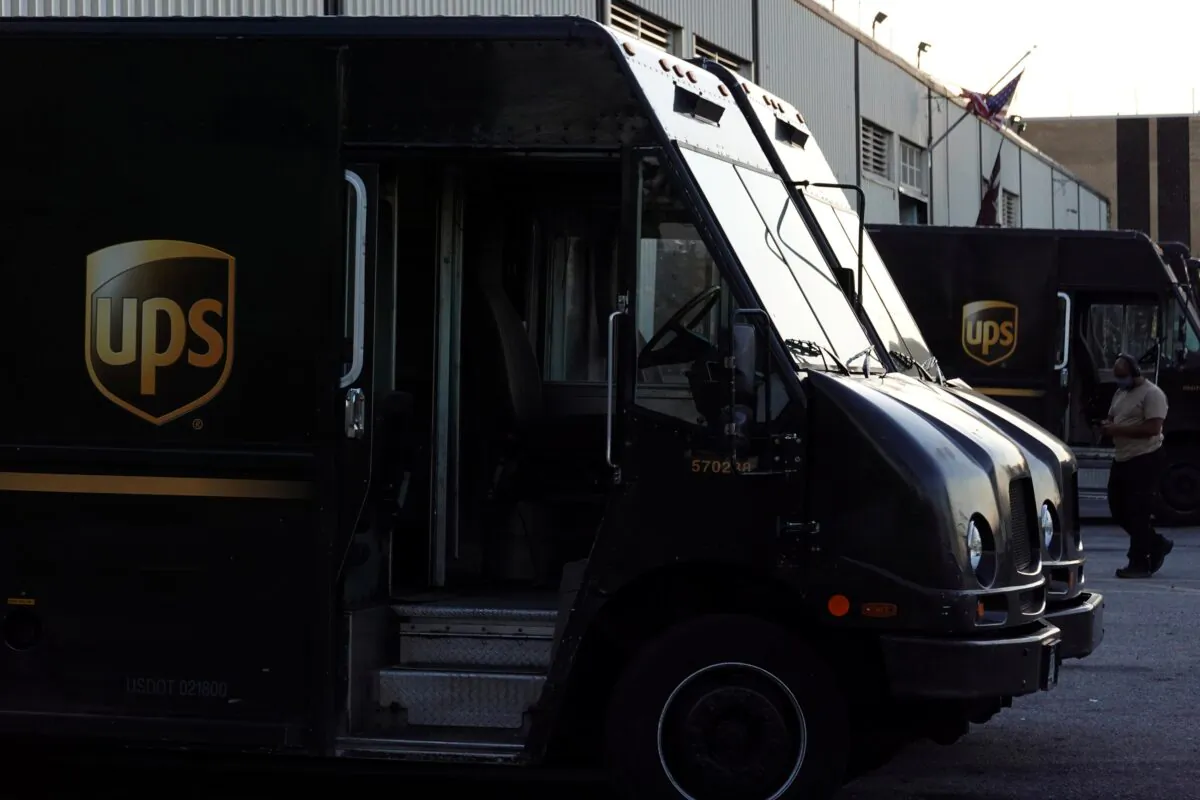 United Parcel Service (UPS) vehicles at a facility in Brooklyn, New York, on May 9, 2022. (Andrew Kelly/Reuters)
